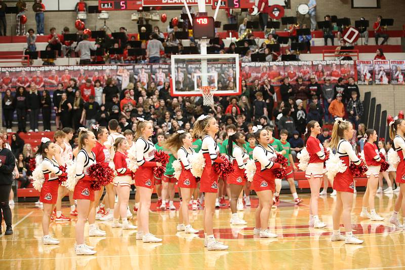 Ottawa cheerleaders perform during the beginning of the game in Kingman Gymnasium on Friday, Feb. 10, 2023 at Ottawa High School.