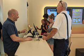 Smiles abound during soft opening for Candy Cloud store in Oswego