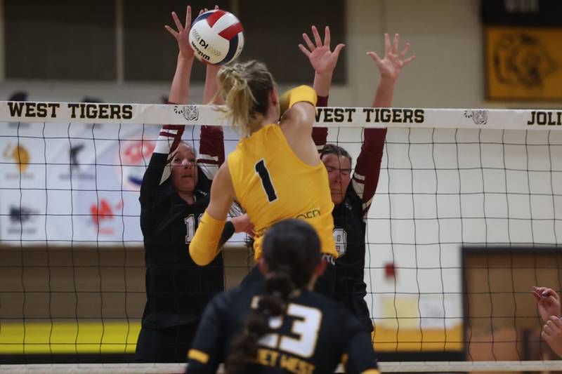 Plainfield North’s Ella Strausberger, left, blocks a shot against Joliet West on Wednesday, Sept. 6, 2023 in Joliet.