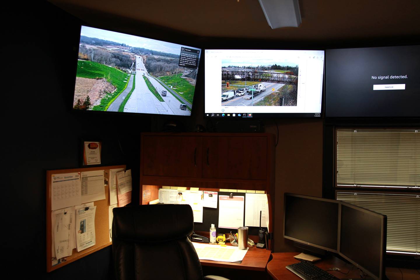 The command center at the Kane County Department of Transportation headquarters in Campton Hills displays live weather updates and road conditions.