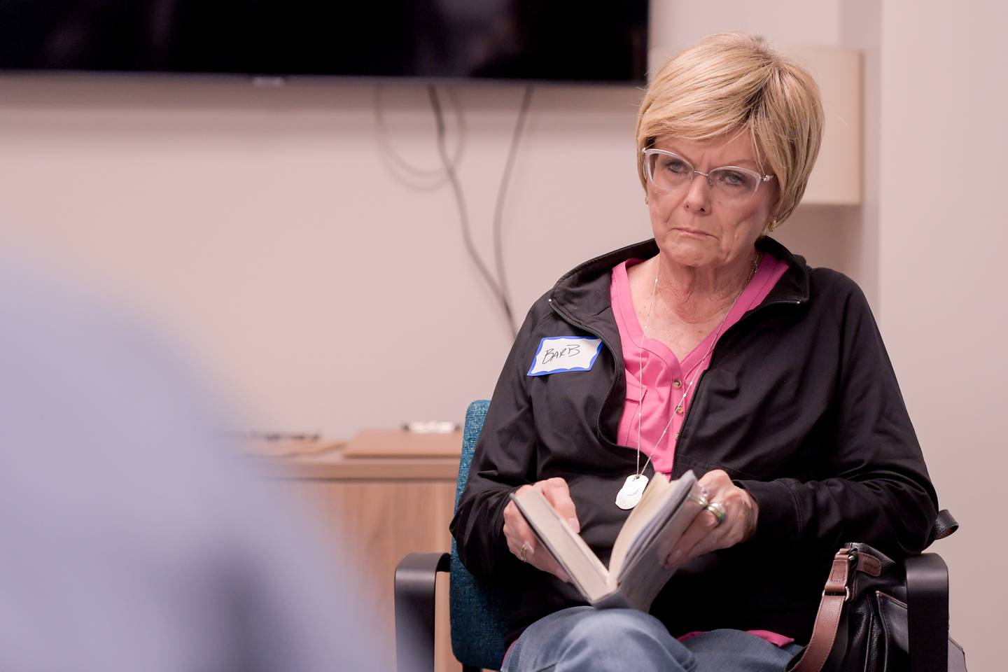 Barb Denges of Bartlett attends the Hands of Hope's grief book club, Turning the Page, A book club for grief and growth in Geneva on Monday, April 1, 2024.