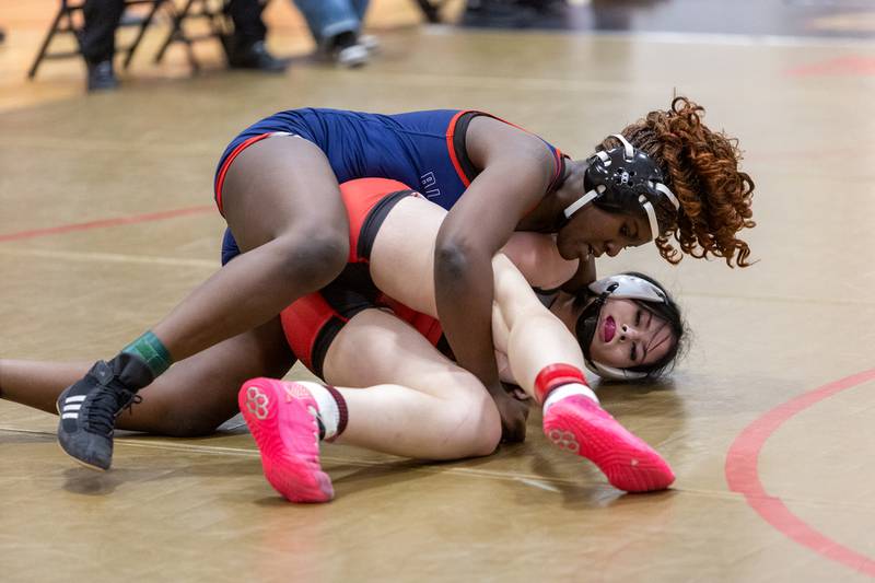 East Aurora's Olena Ftoma competes with West Aurora's Kiveni (Tiffany) Manungu in the 170 lb class at the Batavia Girl's Invitational on Friday, Jan. 16,2026 in Batavia.