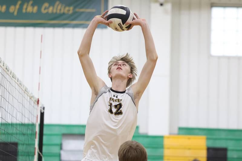 Joliet West’s Landon Brouwer sets the ball against Providence on Tuesday, April 16, 2024 in New Lenox.