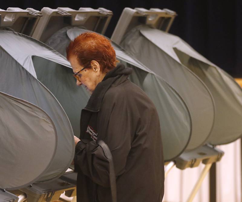 A voter casts their ballot Tuesday, April 4, 2023, in the 2023 consolidated election at Del Webb Sun City’s Prairie Lodge in Huntley.