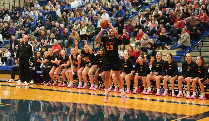 Batavia’s Addie Prewitt (23) shoots a three pointer against Geneva during a basketball game at Geneva High School on Friday, Dec 15, 2023.