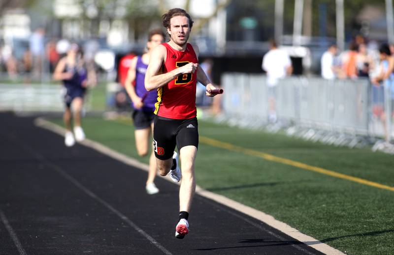 Batavia’s Johan Fallon runs the anchor leg of the 4x800-meter relay during the Kane County Boys Track and Field Invitational at Geneva High School on Monday, May 9, 2022.