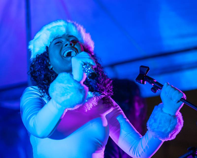 Cady Larson of Harmonix belts during the band's performance at Frosty on First on Friday, November 7, 2025 on First Street in La Salle.