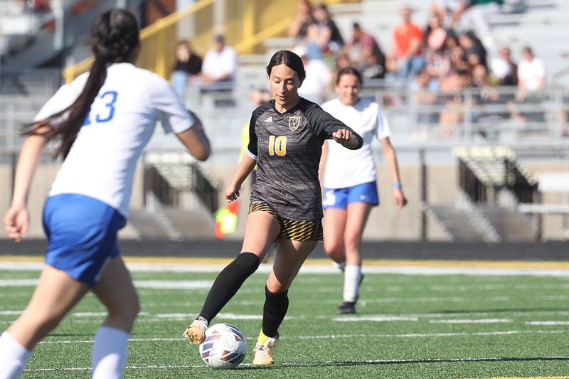 Joliet West’s Julia Martinez works the ball against Joliet Central on Tuesday, April 30, 2024.