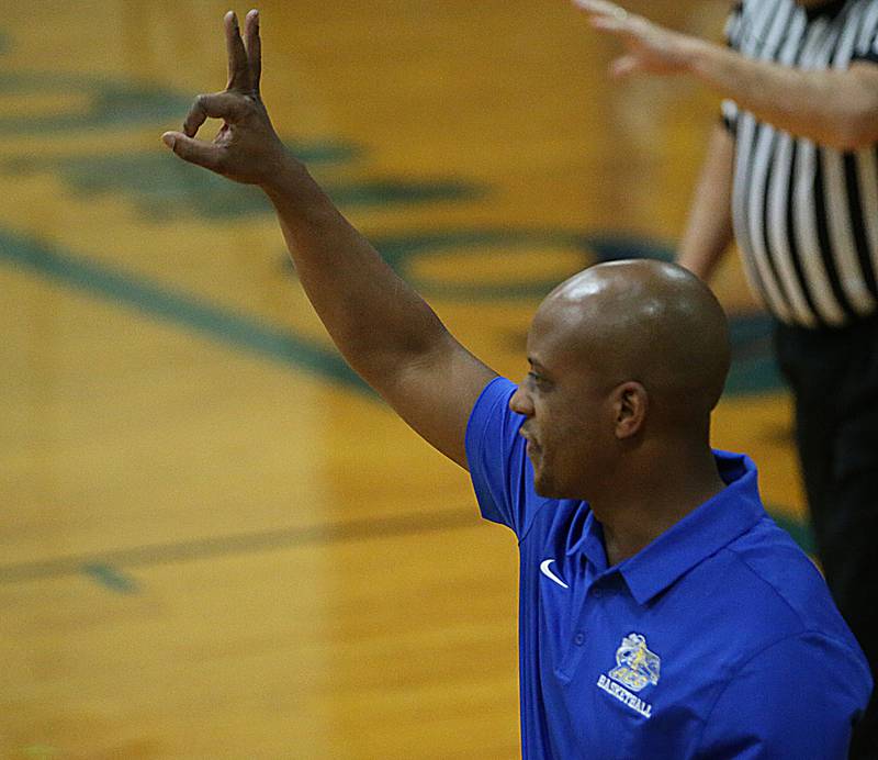 Aurora Central Catholic head girls basketball coach LeVada Smith coaches his team in the Tim Humes Breakout Tournament on Friday, Nov. 18, 2022 in Somonauk.