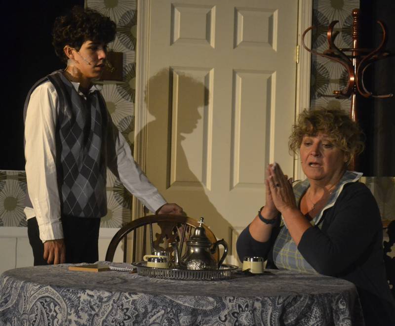 Alexander Garcia (from left) portrays Jim Quinn, and Nadine Franklin plays Louise Schmitt in "Prodigal Son," presented by Elgin Theatre Company.