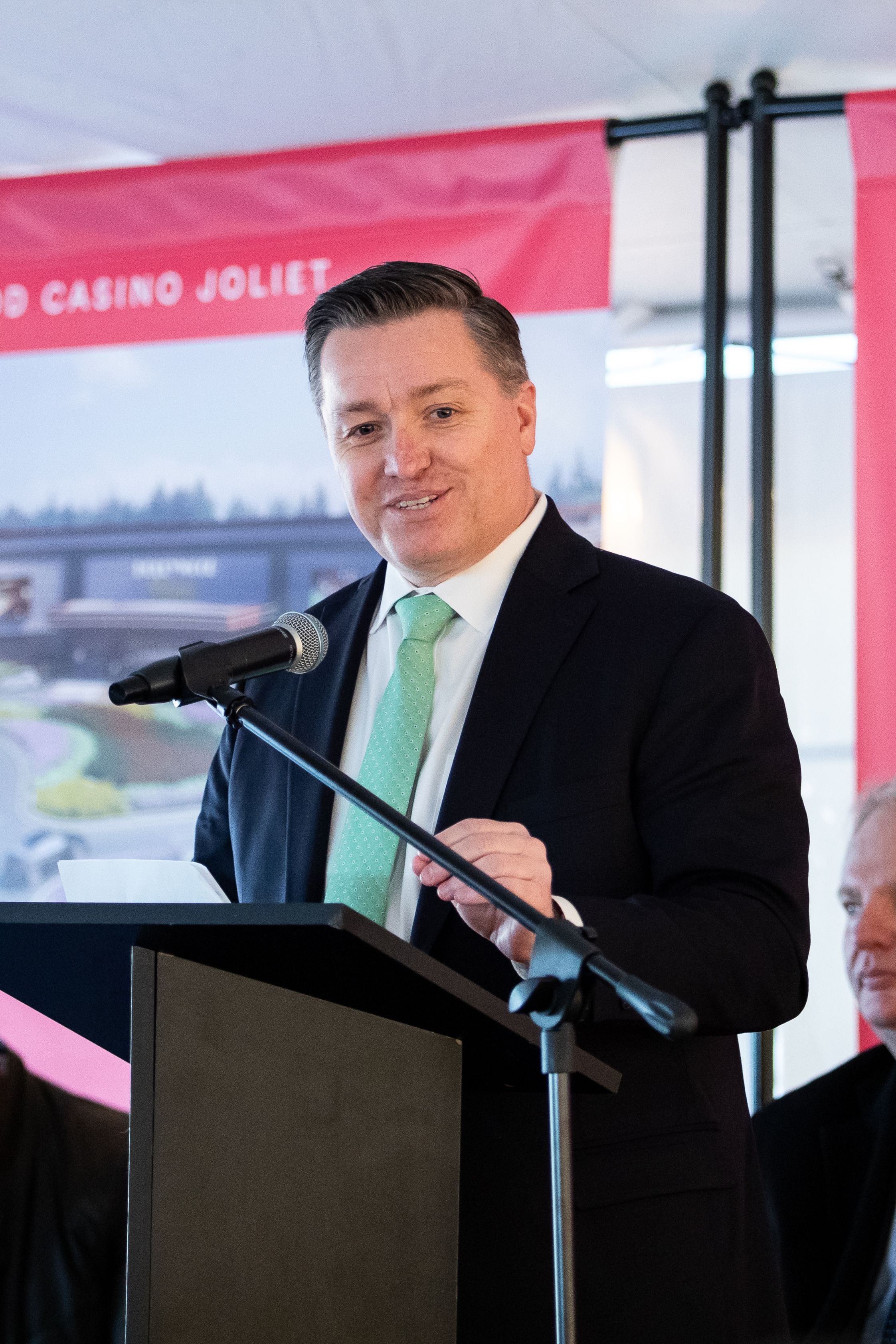 Doug Pryor, President and CEO of the Will County Center for Economic Development, delivers remarks at the Hollywood Casino Joliet Groundbreaking Ceremony on Dec. 13, 2023.