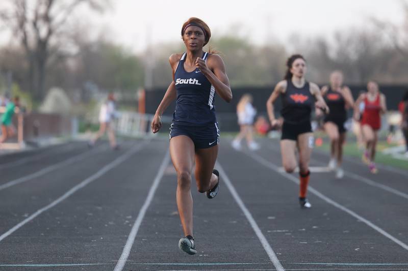 Plainfield South’s Jahnel Bowman finish first in the 400-meter dash at the Minooka Girls Track and Field Invitational on Friday, April 14, 2023, in Minooka.