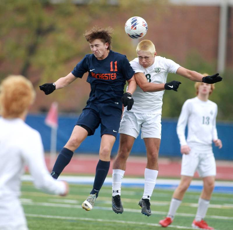 Rochester’s Lach Sullivan (left) and Crystal Lake South’s Hayden Stone head the ball during the Class 2A state semifinal match at Hoffman Estates High School on Friday, Nov. 3, 2023.