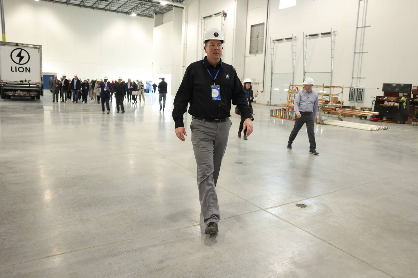 Lion Electric vehicle manufacturing facility General Manager Eric Pansegrau gives a tour during a press conference and interactive tour the new manufacturing facility.. Monday, Mar. 21, 2022, in Joliet.