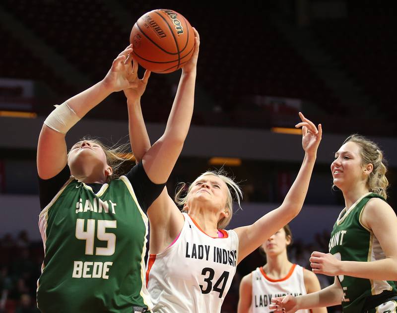 St. Bede's Savannah Bray grabs a rebound over Altamont's Skylie Klein during the Class 1A third-place game on Thursday, Feb. 29, 2024 at CEFCU Arena in Normal.