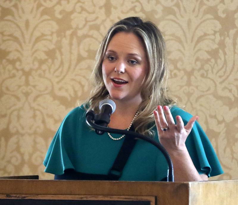 Award recipient Leslie Blake speaks during the Northwest Herald's Women of Distinction award luncheon Wednesday June 7, 2023, at Boulder Ridge Country Club, in Lake in the Hills. The luncheon recognized 10 women in the community as Women of Distinction.