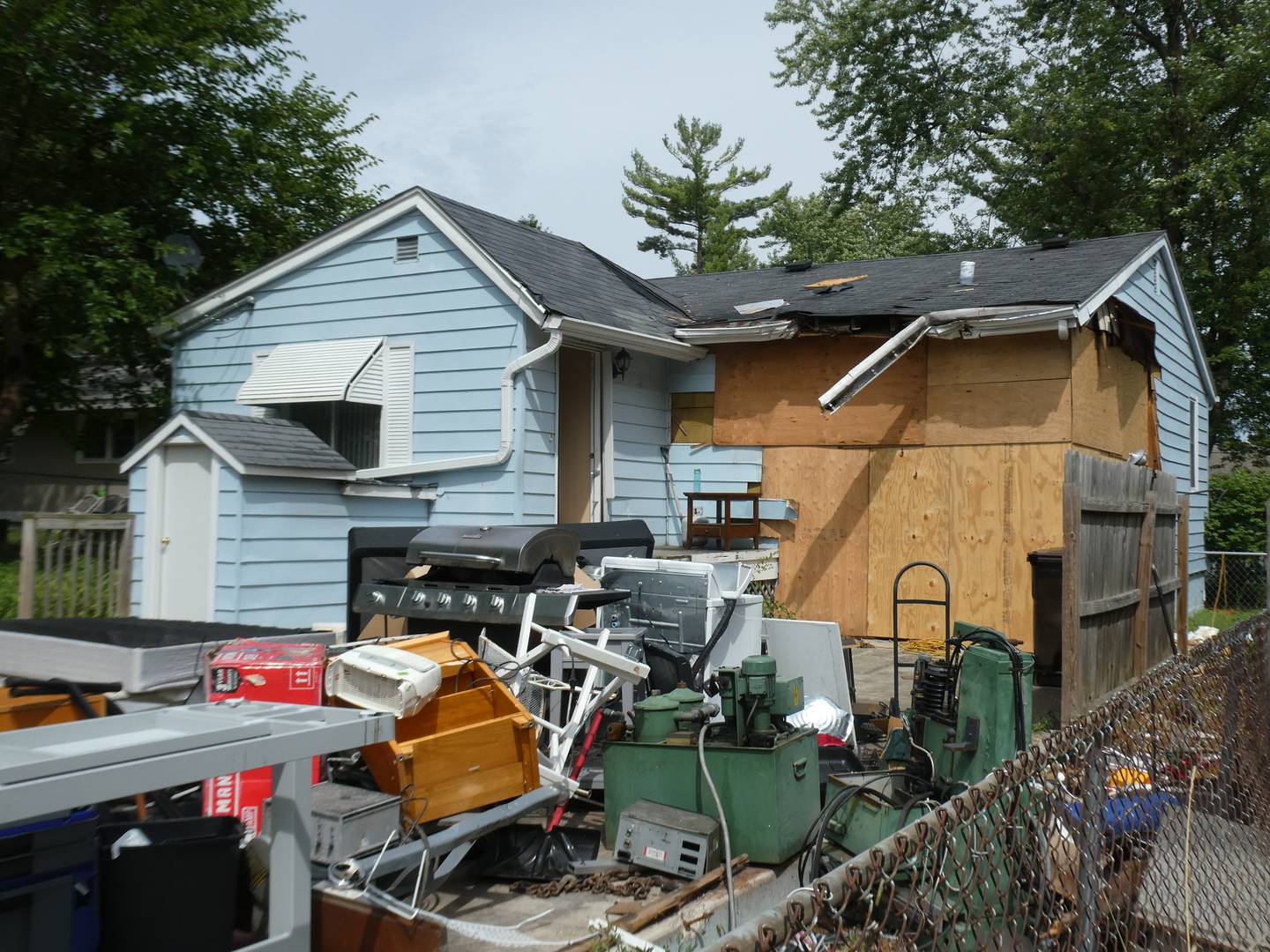 One week later, on August 3, 2022, the home in Crystal Lake where a car crashed through a garage has been boarded up and damaged furniture has been piled in the yard. But the homeowner injured in the accident, 64-year-old Angelo Pleotis, could be paralyzed for life, his family says.