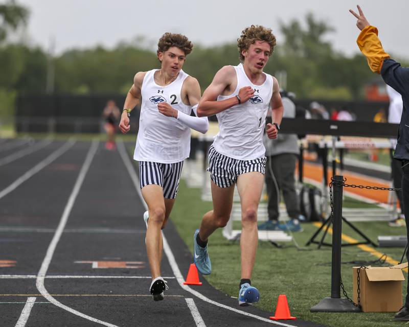 Plainfield South's Alex Batsala (L) and Dylan Maloney finish first and second to advance in the 3200m at the Class 3A Minooka Sectional Boys Track and Field Meet Wednesday, May 21, 2025 in Minooka.
