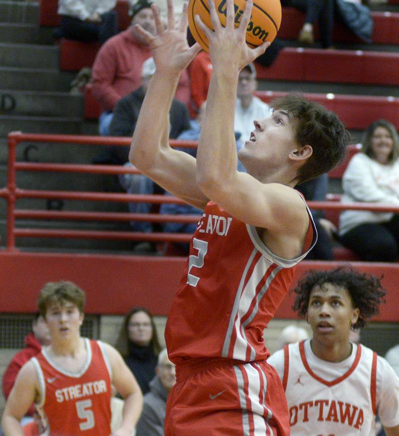 Streator’s Matt Williamson goes in for a layup in the second period Saturday against Ottawa during the Dean Riley Shootin’ the Rock Thanksgiving Tournament championship game.