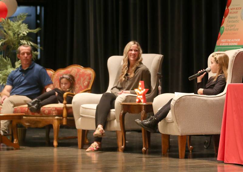 Author Reese Carney of Utica (right), talks about writing her book titled "Reeses Fantastic Surgery Adventure" on Monday, Nov. 6, 2023 in Matthiessen Auditorium at La Salle-Peru Township High School.