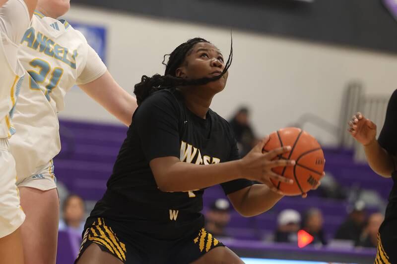 Joliet West’s Jada Thompson goes in for the basket against Joliet Catholic in the 2023 WJOL Girls Basketball Tournament on Friday, Nov. 17, 2023, in Joliet