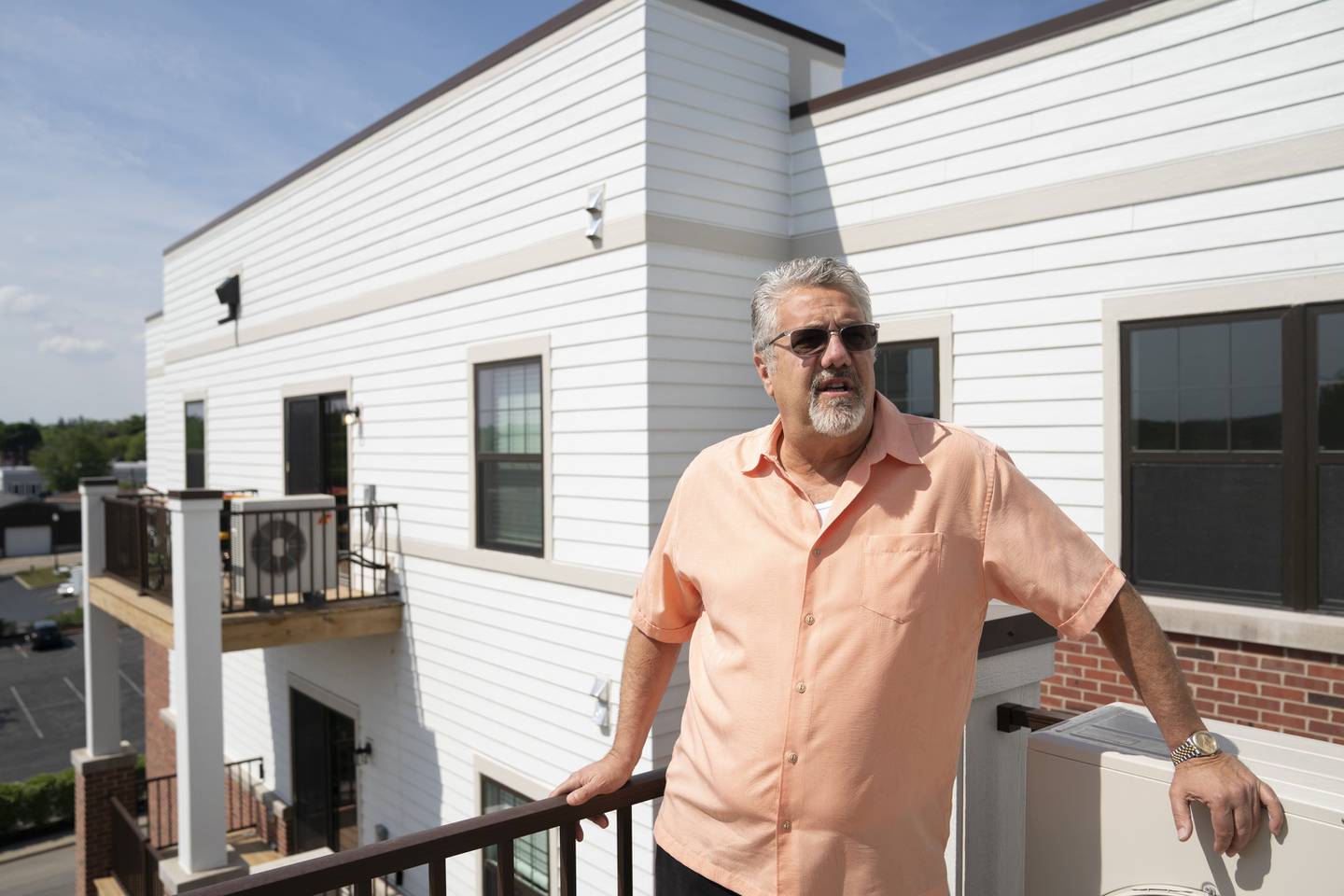 Developer and owner Joseph Billitteri at the newly built Woodstock Square Apartments on Madison and Church streets in Woodstock. Residents began to move in this week to the 30-unit, five-story apartment complex.