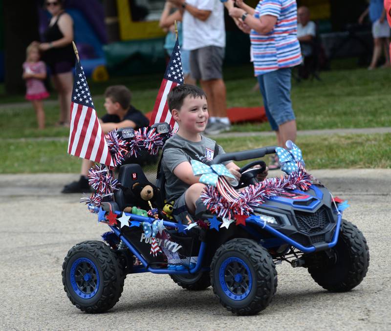 Miles Hallock drives his entry in the Let Freedom Ring Kiddie Parade on Saturday, July 5, 2025.