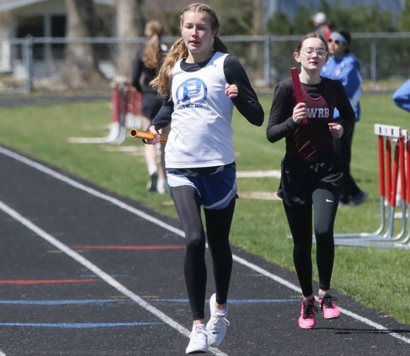 Princeton's Lexi Bohms runs in the girls 4x800 relay during the Rollie Morris Invite on Saturday, April 16, 2022 at Hall High School in Spring Valley.