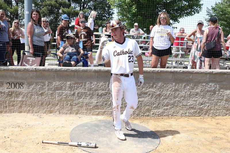 Joliet Catholic’s Trey Swiderski stands by family and friends after the Hilltoppers win against Spring Valley Hall in the Class 2A Geneseo Supersectional on Monday, May 29, 2023 in Geneseo.