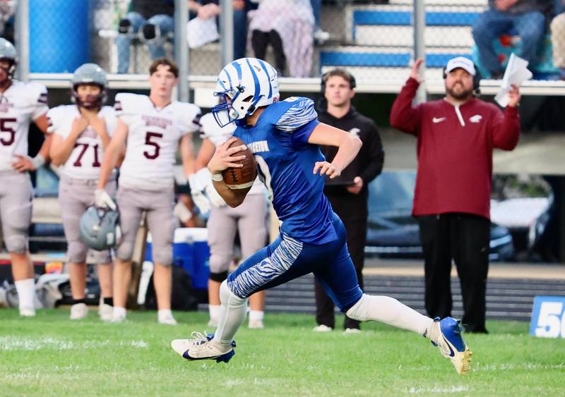 Princeton's Kaleb Caldwell races for an 80 kickoff return touchdown in the first half of Friday's game at Bryant Field. The Tigers lost to Rockridge 36-29.