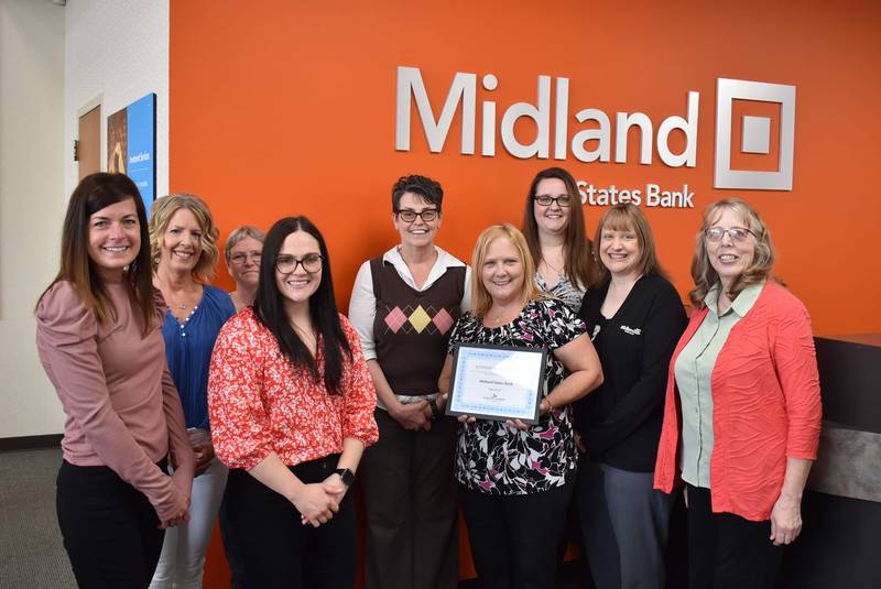 Midland States Bank was named the May 2023 Streator Area Chamber of Commerce business of the month. Pictured at the celebration are (back row, left to right) Beth Retoff, Andrea Girard, Lisa Piecha, Melissa Givens, Nicole Timm, Carri Alexander (Midland States Bank); (front, left to right)  Courtney Levy and Judy Booze (Streator Chamber) and Theresa Solon Wargo (Streator Young Professionals).