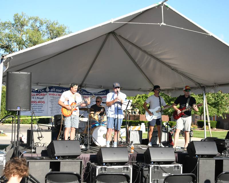 The band CAM preforms on Sunday Sep. 1, 2024, during the Cue for a Cause event held in downtown Elmhurst.