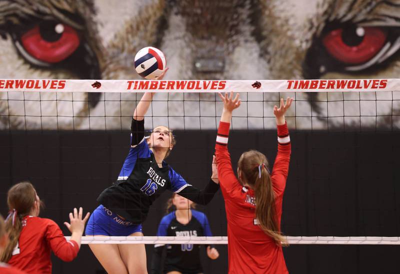 Hinckley-Big Rock's Emma Orin spikes the ball by Indian Creek's Cheyanne Buh during their match Tuesday, Sept. 9, 2025, at Indian Creek High School in Shabbona.