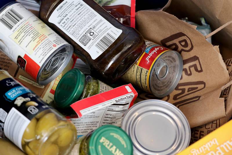 Food donations are collected in a bin at the Cary-Grove Area Chamber of Commerce, 445 Park Ave on Monday, Nov. 16, 2020 in Cary. The Chamber is collecting food donations for a Thanksgiving drive for the Cary-Grove Food Pantry through Nov. 19 and will deliver the donations on Tuesday, Nov. 24.