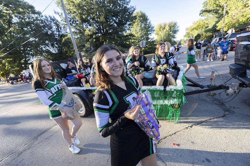 The Rock Falls cheer squad marches through the homecoming parade Thursday, Sept. 25, 2025.