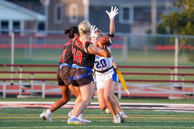 Geneva’s Hadley Mason (20) rushes Yorkville's Brooke Ekwinski (18) during a non-conference game at Yorkville High School on Tuesday, Sept. 2, 2025.