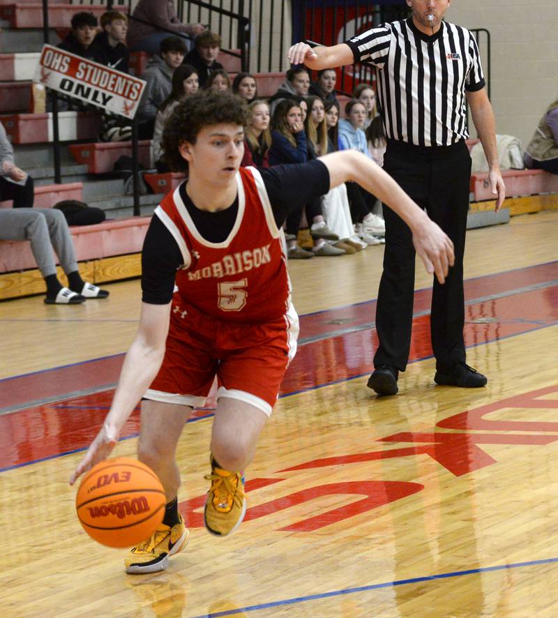 Morrison's Brayden Rubright (5) dribbles against Oregon during a Saturday, Jan. 11, 2025 game at the Blackhawk Center in Oregon.