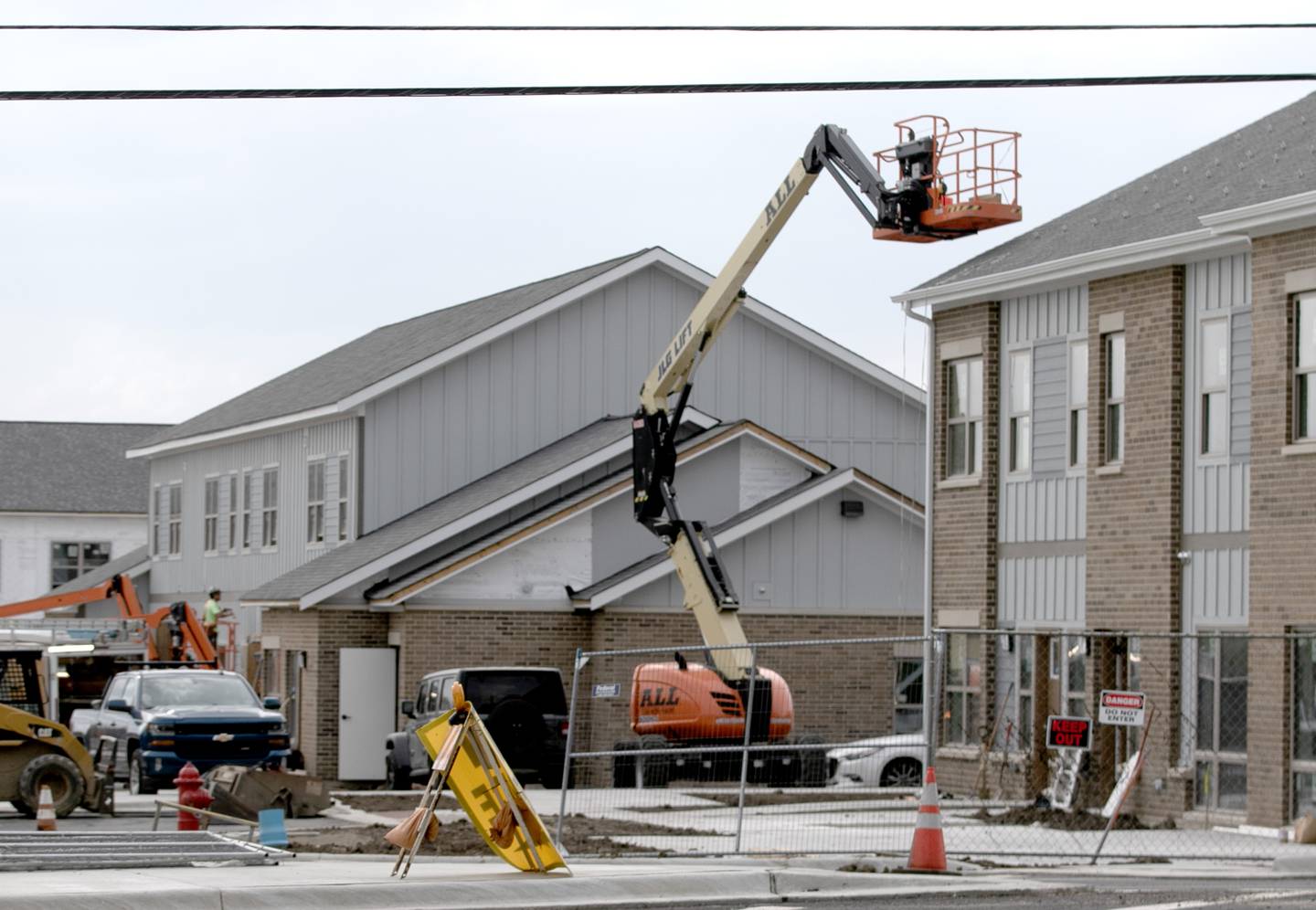 Work continues on General Capital's townhome style rental units at Route 31 and Johnsburg Road on Wednesday, Oct. 30, 2024. The townhomes are clustered in seven-unit buildings and include one-, two- and three-bedroom rentals that are directed at families and young people in the working world.