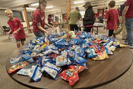 Photos: Mt. Morris church creates care packages for U.S. Navy sailors