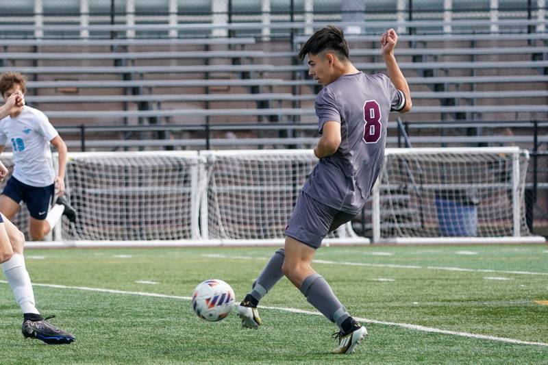 Morton’s Enrique Ayala (8) shoots the ball for a goal against during a soccer match against Downers Grove South at Morton High School in Berwyn on Saturday, Oct. 5, 2024.