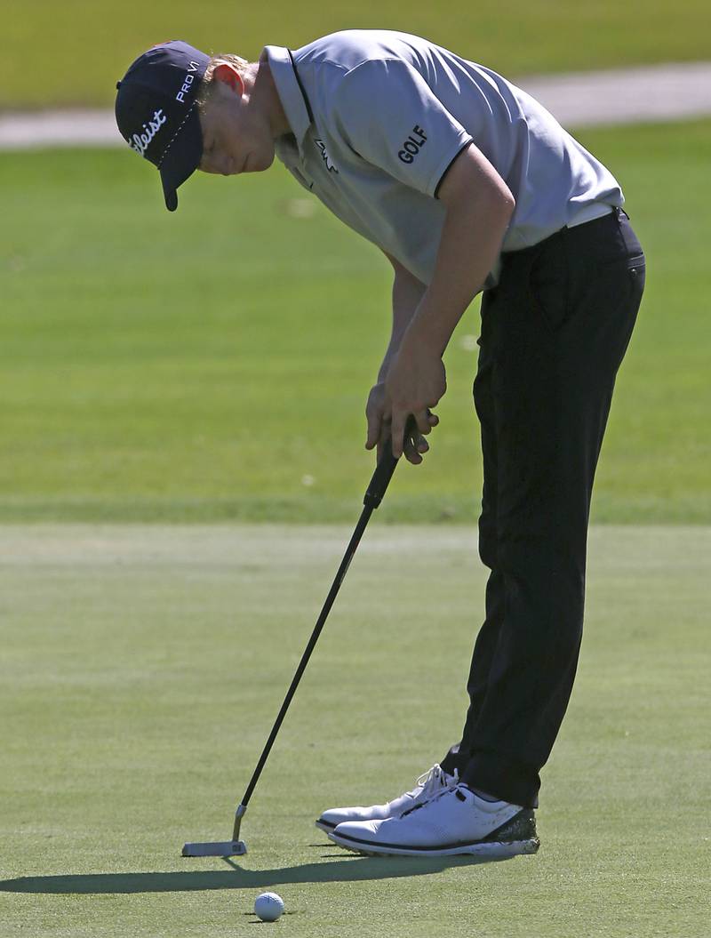 Prairie Ridge’s JJ Lee reacts to missing a putt on the 6th green during the Fox Valley Conference Boys Golf Tournament Wednesday, Sept. 25, 2024, at RedTail Golf Club in Lakewood.