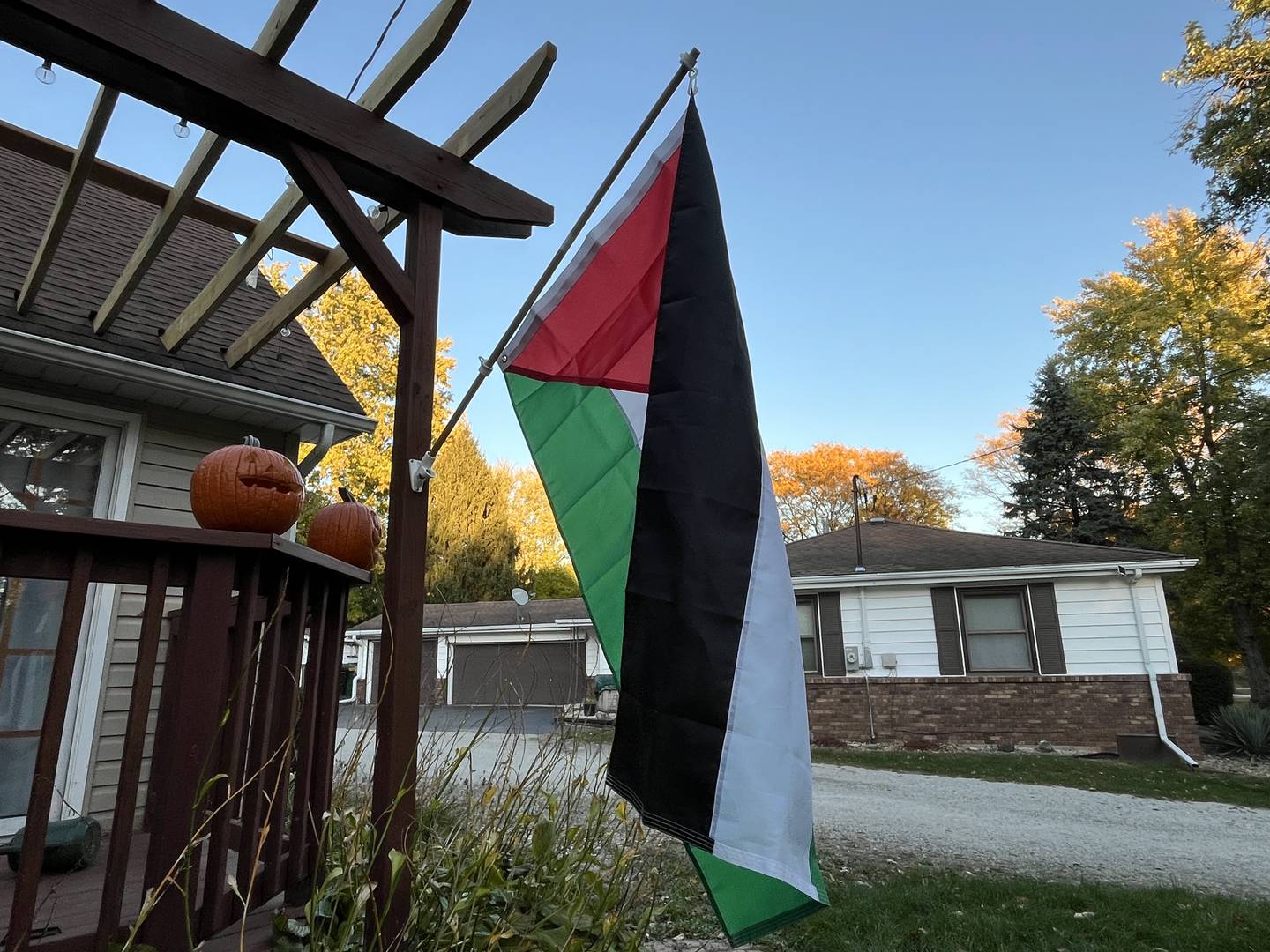 A new flag of Palestine seen hanging from the porch on Wednesday, Oct. 23, 24, at a Lockport Township residence.