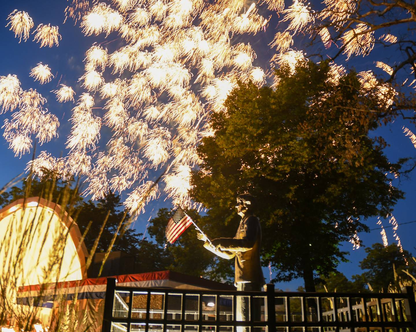 Fireworks go off at Hopkins Park in DeKalb Tuesday, July 4, 2023 during the annual Independence Day celebration.
