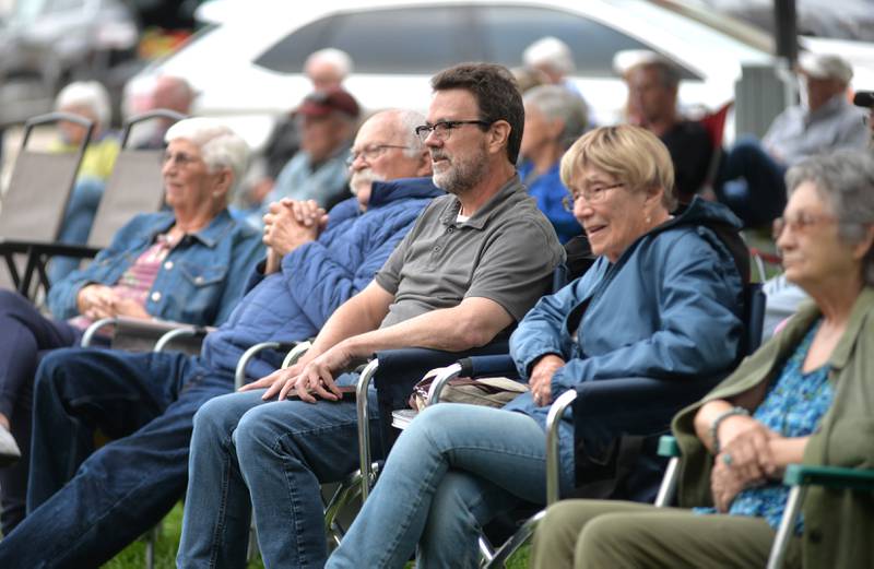Kable Concert Band Member Sylvia Saunders (second from right) listens to the music of the All-Star Superband on Wednesday, Aug. 27, 2025 at the Jamboree Concert Series in Mt. Morris.