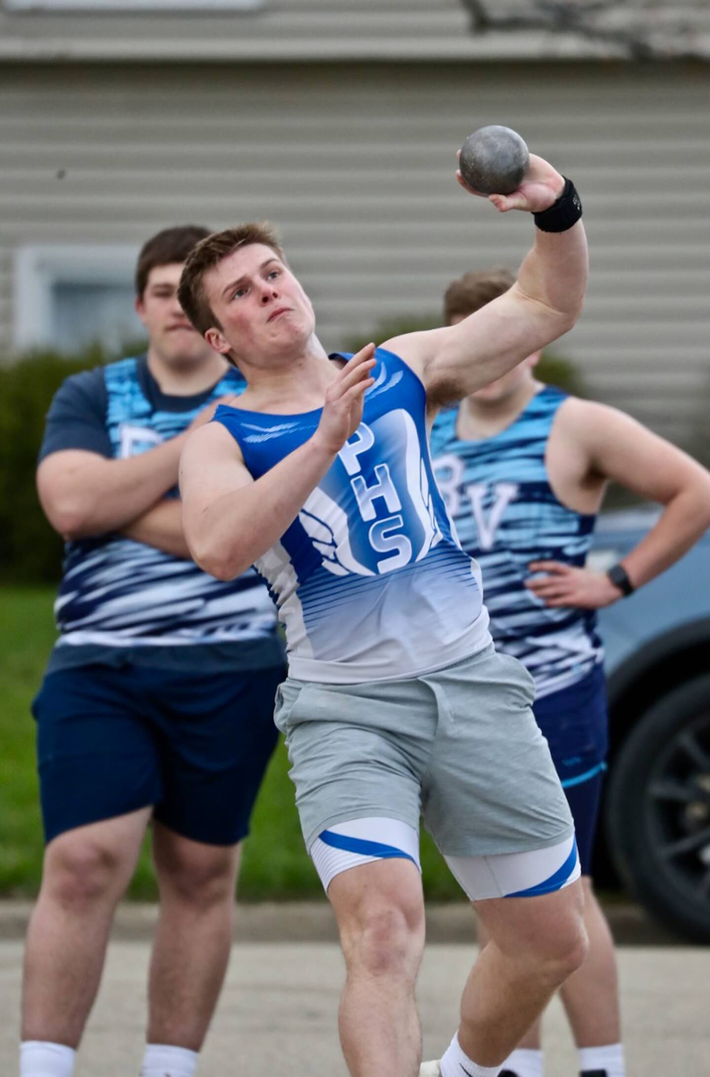 PHS' Drew Harp throws the shot put in Monday's Howard-Monier Invitational at Princeton.