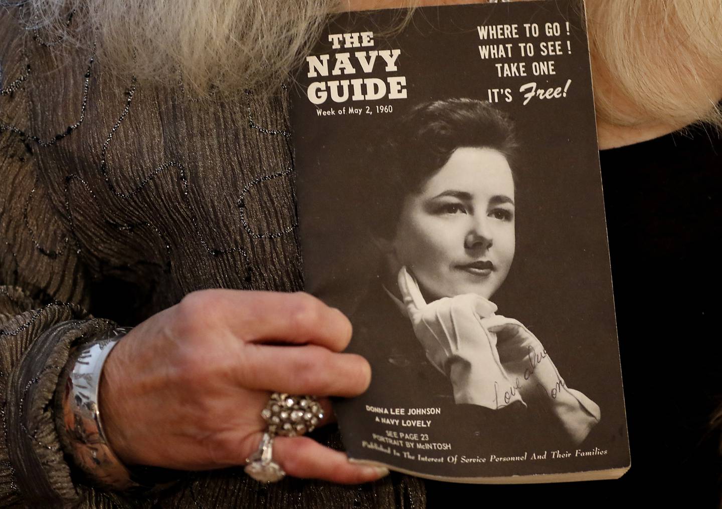 U.S. Navy veteran Donna Vestal holds a copy of the Navy Guide that feature her on the cover at her home on Thursday, Oct. 17, 2024, in Crystal Lake.