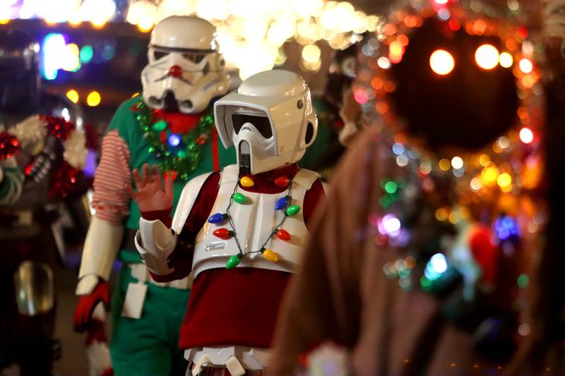 Star Wars characters greet parade goers during the Festival of Lights Holiday Parade in downtown Crystal Lake on Friday, Nov. 29, 2024.
