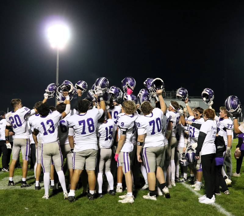 Rochelle players celebrate their win over Kaneland on Friday.