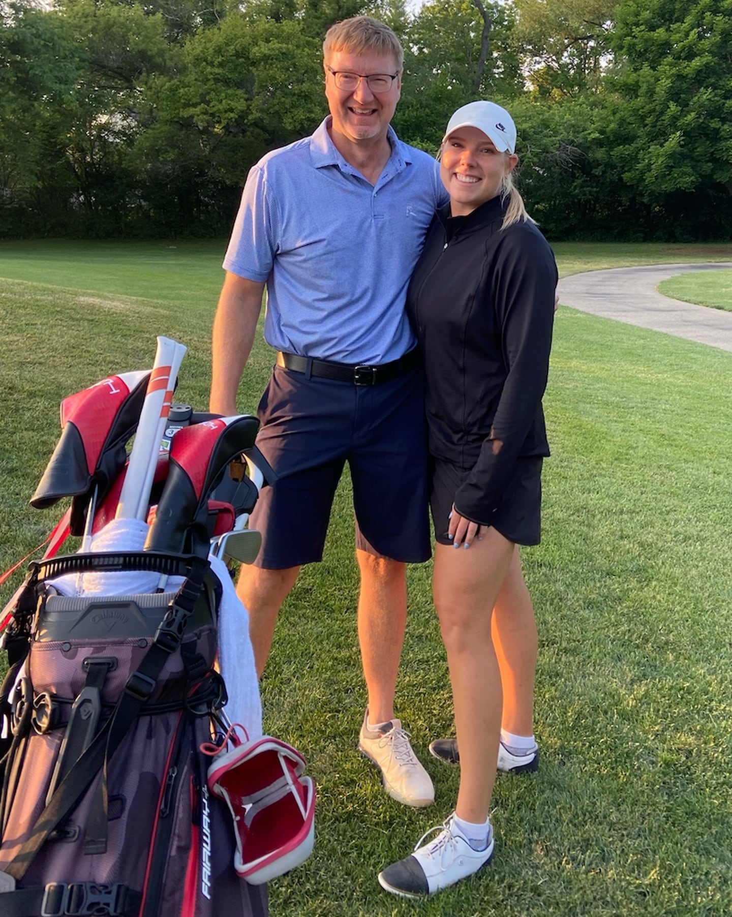 Spring Grove's Mackenzie Hahn (right) and her dad, Ron, pose for a picture at Palatine Golf Club on Wednesday. Mackenzie Hahn qualified for the U.S. Women's Open, held July 6-9 at Pebble Beach, California.
