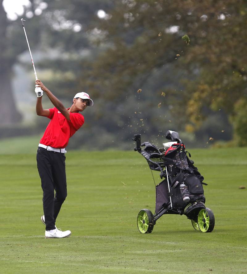 Huntley’s Taig Bhathal hits a fairway shot on the third hole during the IHSA Class 3A Hampshire Regional golf tournament on Wednesday, Sept. 27, 2023, at Randall Oaks Golf Club in West Dundee.
